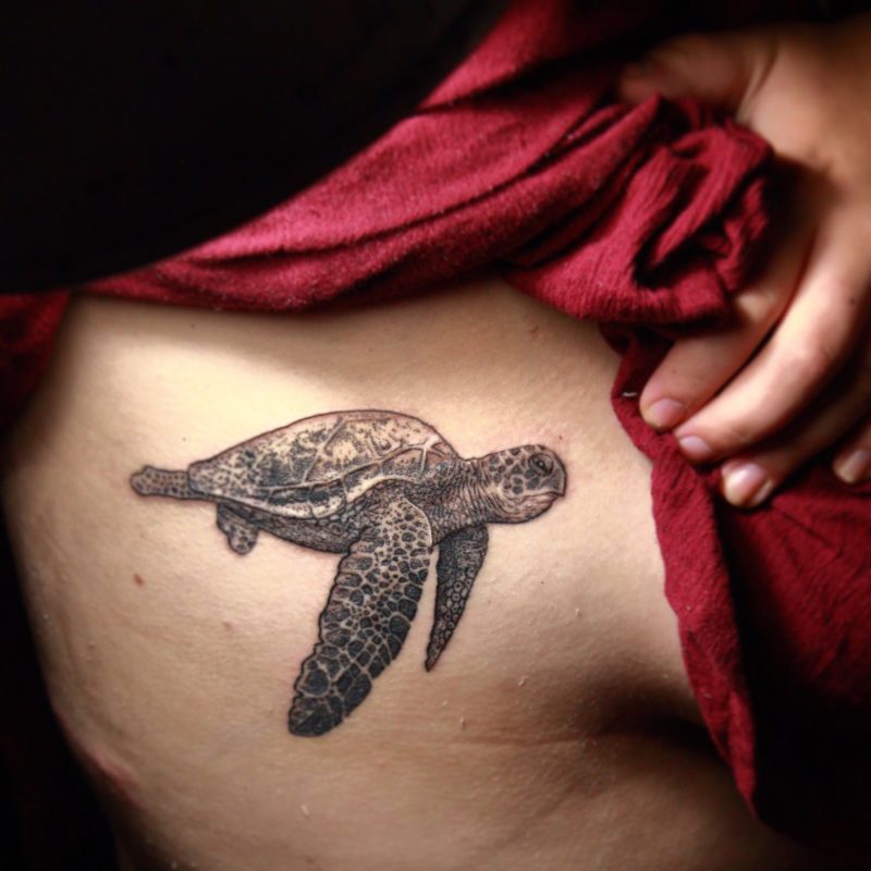 Rib Tattoo for Girls: Sea Turtle dotwork tattoo by The Best Tattoo Artist In Bangalore: Tattoo artist Veer Hegde of Eternal Expression Tattoo Studio.
