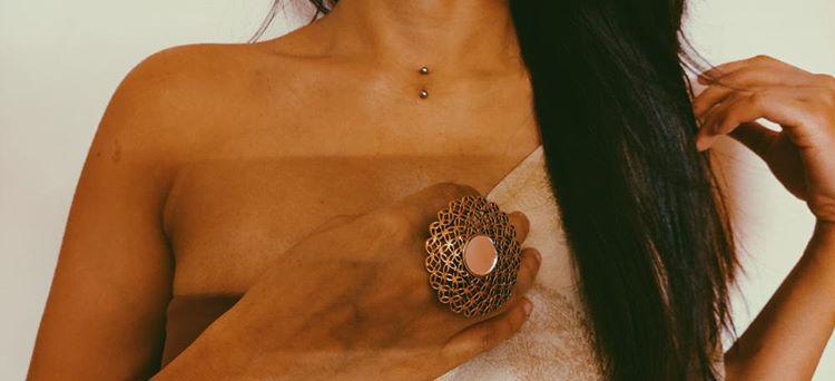 Girl gets a collar bone or (sternum) surface dermal piercing in bangalore by Veer Hegde